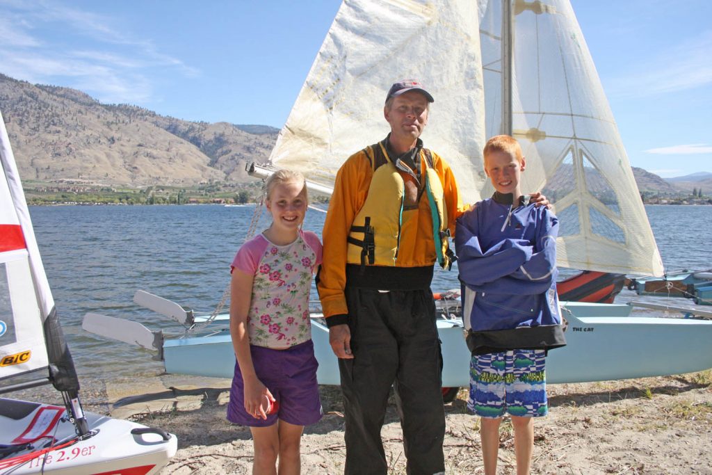 David Mills, along with his daughter Amy, 11, and Kieran, 14, made the long trip from Brooks, Alberta last week to compete in the Lake Osoyoos Sailing Club’s annual regatta. (Keith Lacey photo)