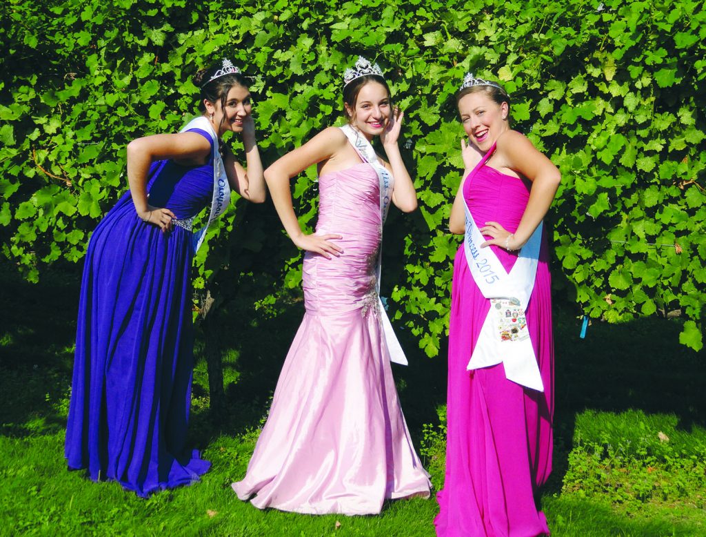 Osoyoos Royalty members (from left )Tianna Morgan, Emma Fernandes, and Bailey Toepfer are shown enjoying themselves at the recent Oliver Pageant. (Photo supplied)