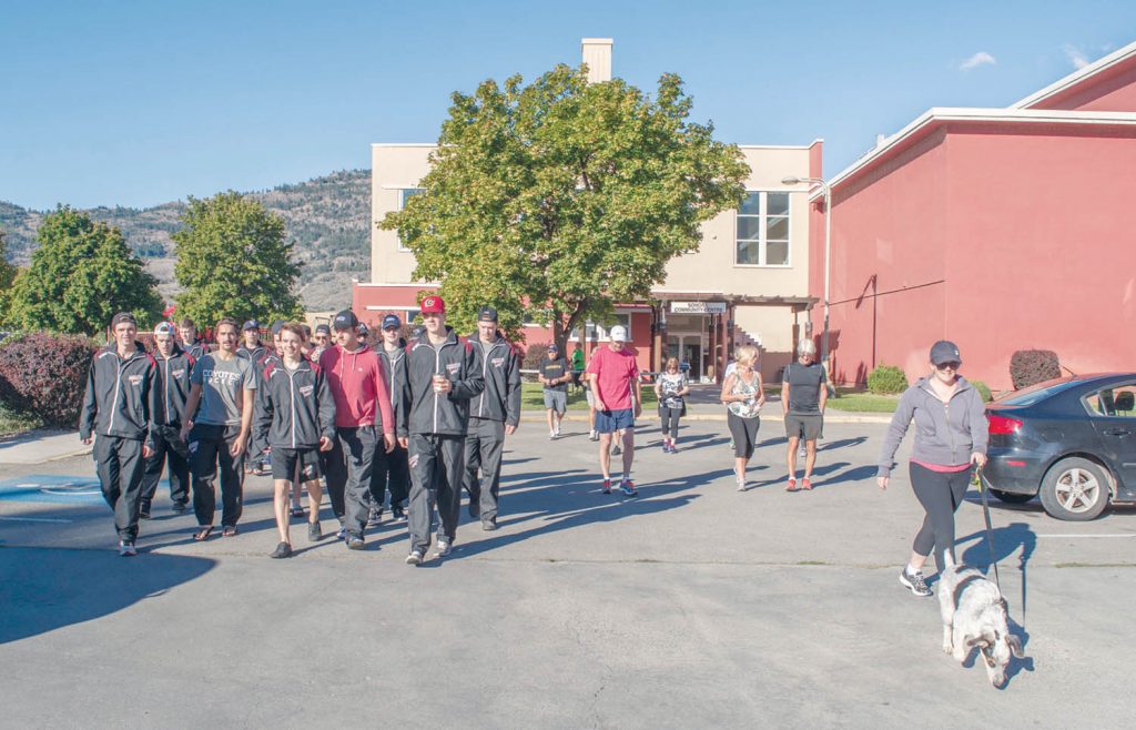 Thirty-three participants, including 18 members of the Osoyoos Coyotes hockey team, are seen embarking on a 10-kilometre trek around Osoyoos, starting at the Sonora Community Centre in Osoyoos this past Sunday morning for the annual Terry Fox Run. A total of $1,785 was raised in this year’s event, which honours the legendary Canadian hero who was halfway finished his Marathon of Hope to run across Canada on one leg and a prosthetic leg when his cancer returned back in 1981. (Dan Walton photo)