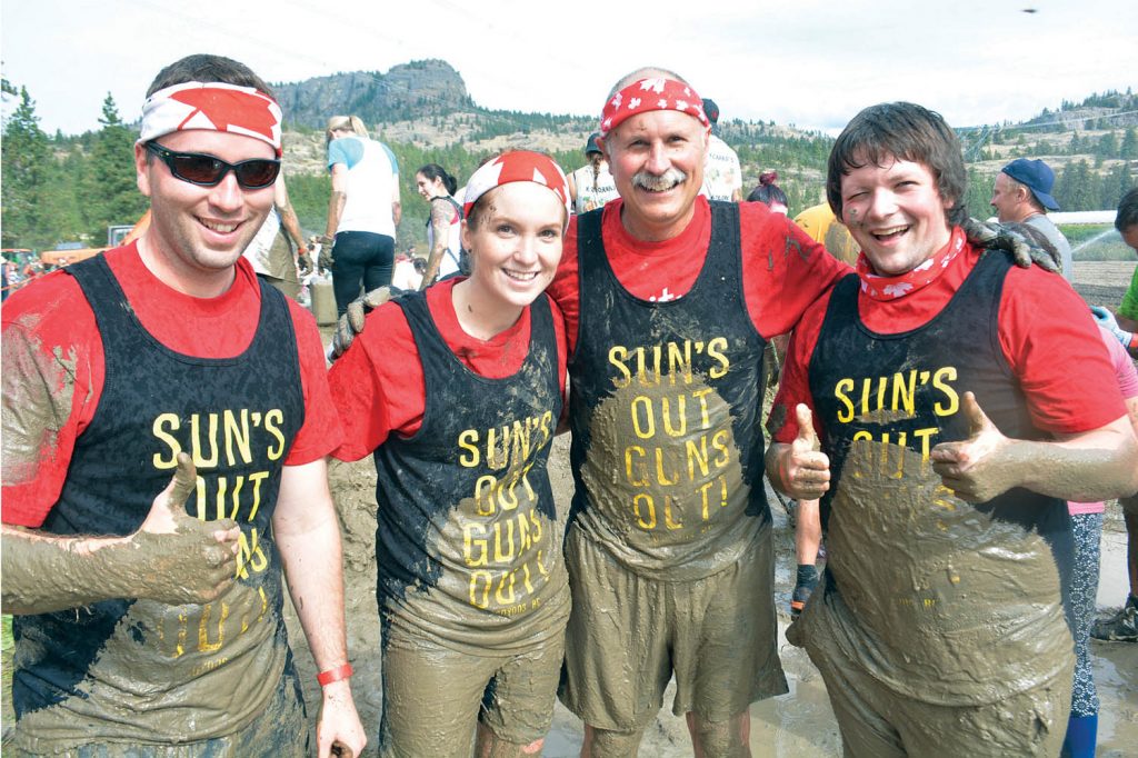 The Osoyoos team of Sun’s Out Guns Out took part in the grueling Freak’n Farmer adventure race at Covert Farms on Saturday. Shown taking a break from the mud pit section are, from left, Travis Loudon, Paige Poturica, Arnold Kettenacker and Christian Beck. (Lyonel Doherty photo)