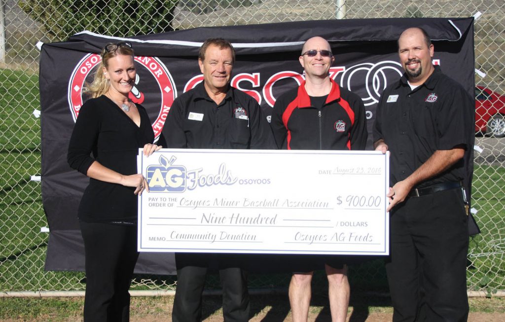 Last week, staff from AG Foods in Osoyoos presented Amy Bartsch, an executive member with the Osoyoos Minor Baseball Association, with a cheque for $900. Minor baseball returned to Osoyoos in 2015 and the program grew immensely this year with 40 more players signed up. Joining Bartsch (from left) were Bob Irwin, AG Foods assistant manager, lead hand Barry Rathgeber and store manager Derek Morgan. (Keith Lacey photo)