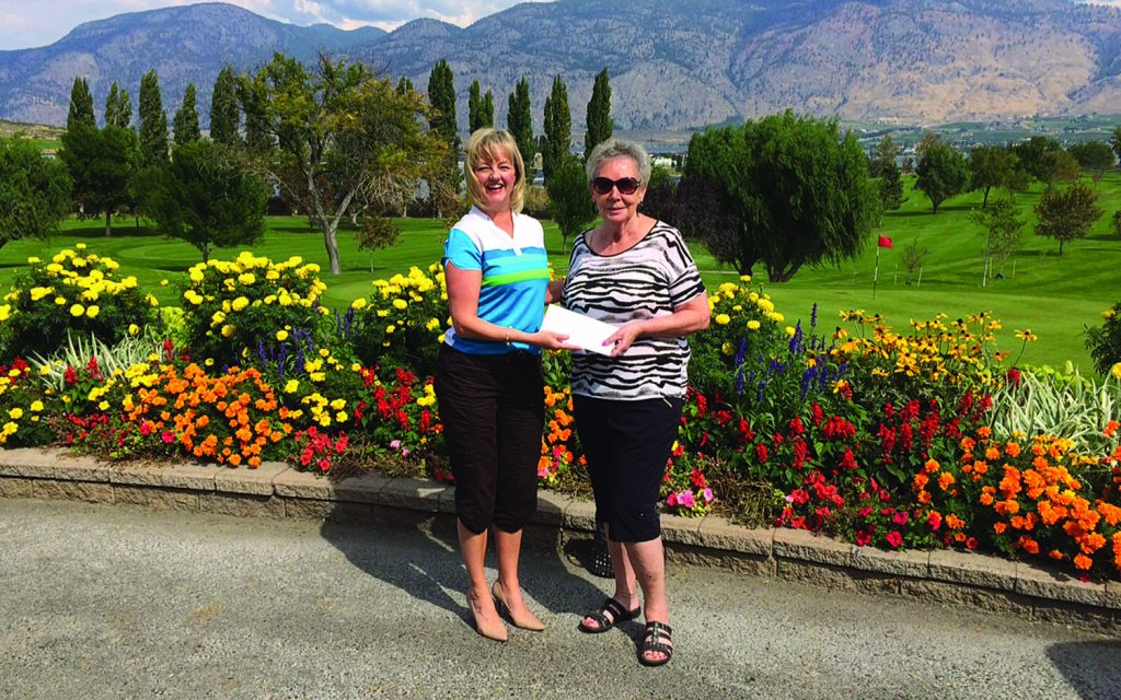 Sharon Bennett of Osoyoos (right) captured the draw last week to win a round of golf for her and seven friends at the Osoyoos Golf Club and lunch from the Greenside Grill. On hand for the special presentation was Audrey McCulloch, manager of marketing and member services for Osoyoos Golf Club. (Photo supplied)