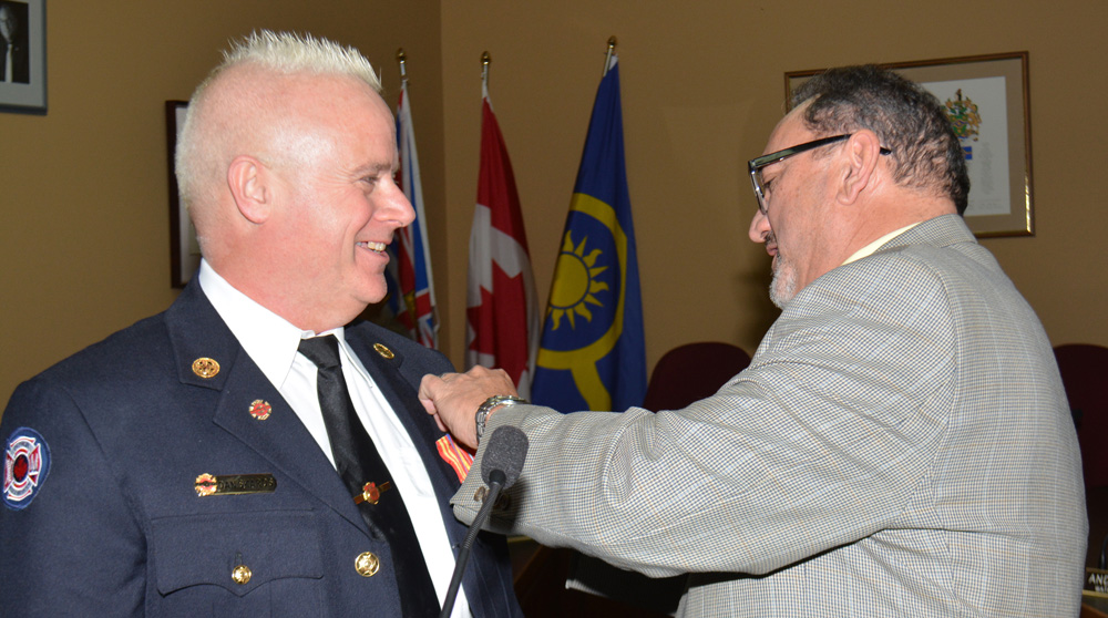 Oliver fire chief gets medal for mettle