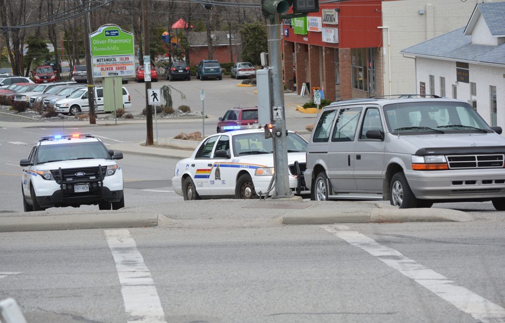 Police help paramedics with uncooperative male