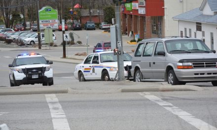 Police help paramedics with uncooperative male