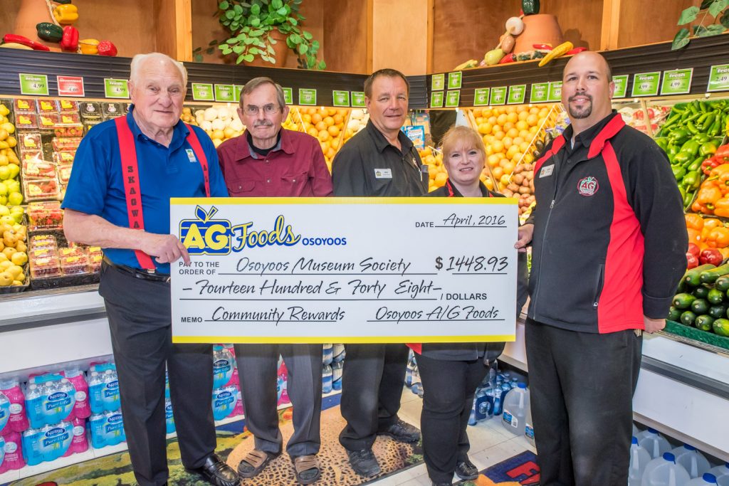 AG Foods last week presented a cheque for more than $1,440 to the Osoyoos Museum Society. The money was raised throughout May last year under the store's Community Rewards program, in which the store contributed a portion to the fund whenever customers purchased certain products. From left are Tony Brummet, vice-president and chair of financing for the Museum Society; Gordon MacIvor, treasurer; Bob Irwin, assistant manager at AG Foods; Marsha Stevens, head cashier at AG Foods and Derek Morgan, manager of AG Foods. (Richard McGuire photo)