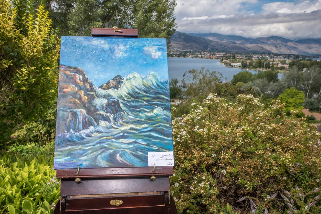 Paintings were literally placed in the garden at artist Sharon Leonard's home during Art in the Garden on the weekend. (Richard McGuire photo)