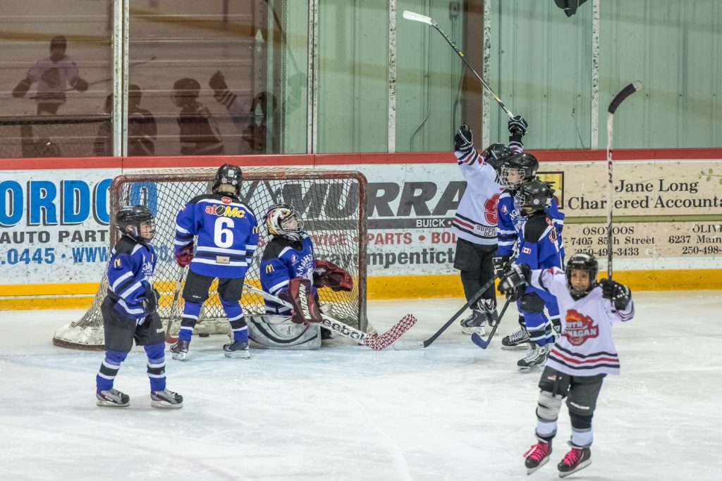 South Okanagan scores a goal in their 3-3 tie opening game against the Quesnel Thunder at last weekend's Atom Fiesta. They then went on to beat Salmon Arm 8-5 and Revelstoke 8-2 to win third place and a spot in the semi-finals. Sunday's playoff game, however, didn't go as well and the local team was eliminated by Merritt 7-1. (Richard McGuire photo)
