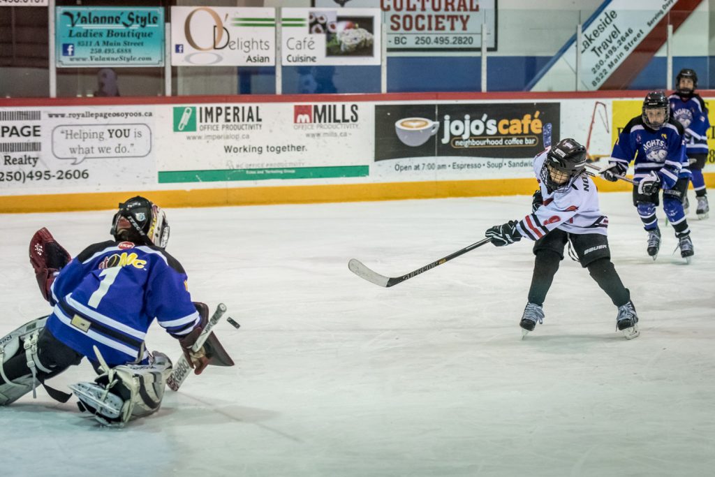 The South Okanagan Minor Hockey Association Atom Rep team put in a strong performance at last weekend’s Atom Fiesta in Osoyoos, making it to the semi-finals, but finishing behind first-place Cranbrook and second-place Merritt. The local team battled Quesnel Thunder to a 3-3 tie in the first game on Friday, pictured here. They went on to beat Salmon Arm 8-5 and Revelstoke 8-2 to win third place and a spot in the semi-finals. Sunday’s playoff game, however, didn’t go as well and the local team was eliminated by Merritt 7-1. (Richard McGuire photo)