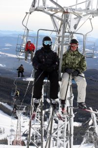 Skiers ride a lift to the top of Mount Baldy. (Keith Lacey file photo)