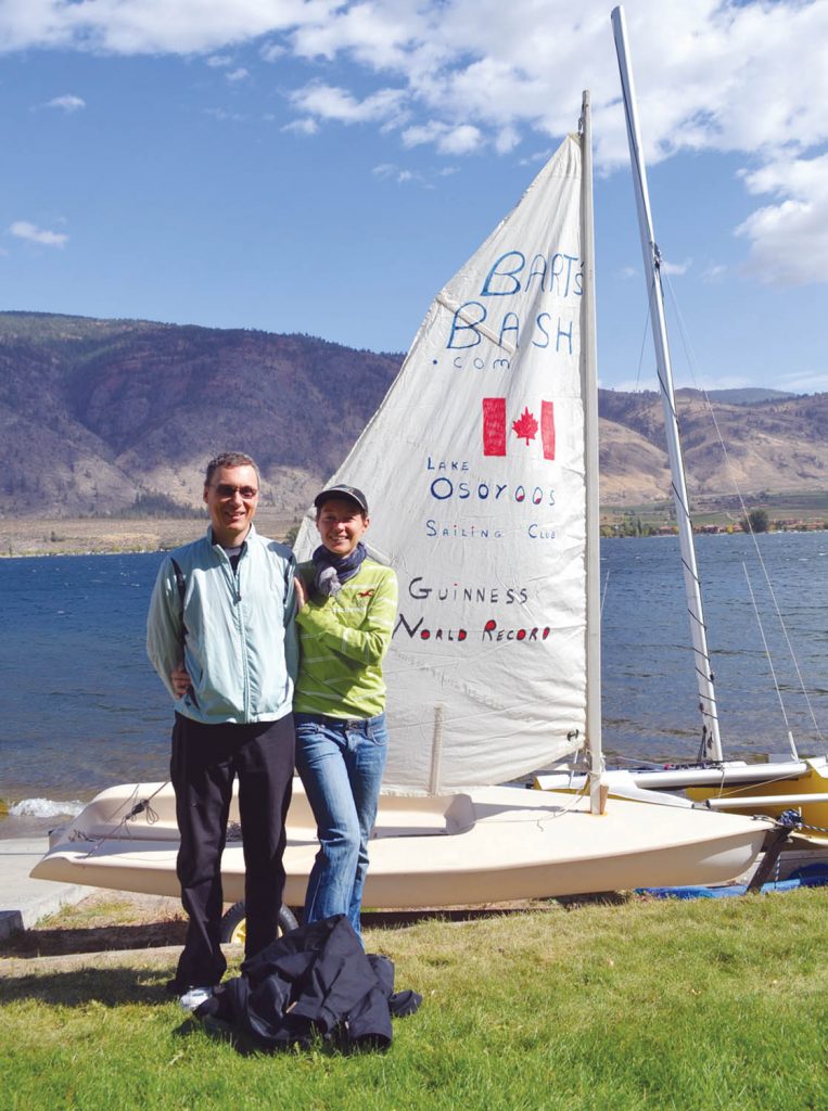 Osoyoos Sailing Club members Jeff Mear and Sophie Laurent were two of numerous club members to battle high winds to participate in Bart’s Bash this past Sunday afternoon on Osoyoos Lake. The event has been recognized by the Guinness World Book of Records as the world’s largest mass participation sailing event. Proceeds from the event are used to promote the sport of sailing to young people. (Trevor Nichols photo)