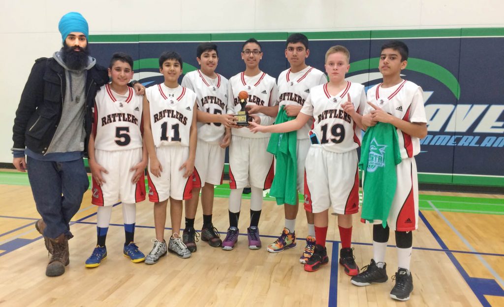 Grade 8 boys at Osoyoos Secondary School took home the trophy as they won a basketball tournament in Summerland last weekend. (Photo supplied)