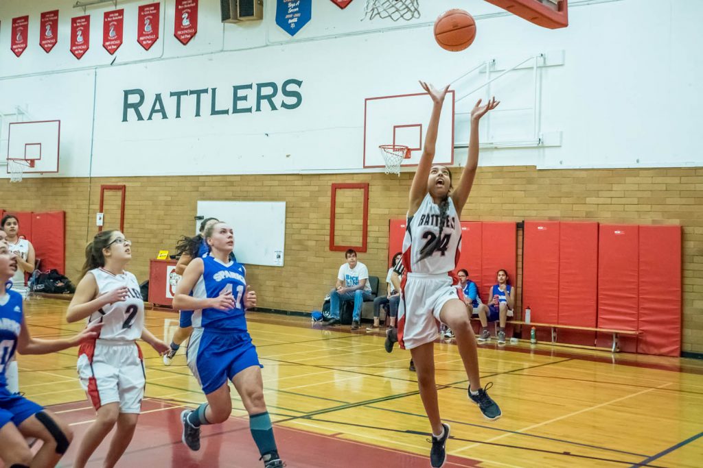 Jasmeen Mallhi teams to toss the ball into the basket as the Osoyoos Secondary School junior girls basketball team played Keremeos at OSS in December. (Richard McGuire photo)