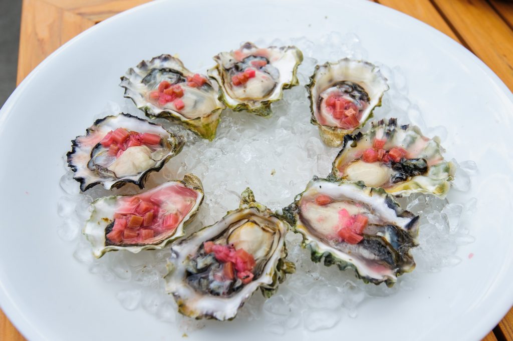 Specially prepared oysters with a white wine were one of the taste experiences guests were offered. (Richard McGuire photo)