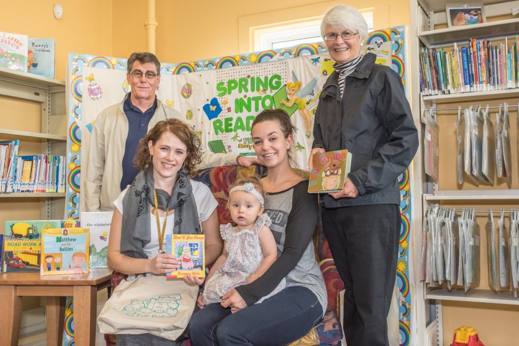 The Royal Canadian Legion Branch 173 has contributed $500 to the Books for Babies program run by the South Okanagan Community Literacy Society. To encourage youngsters to appreciate books and develop early learning, the society gives a bag containing two books to new babies through the Osoyoos Public Health Unit – one book is a hardcover pop-up book for very young children and the other is a softcover book for children when they get a little older. The Osoyoos library branch also participates in the program. Standing are Garry Sutton, representing the Legion and Pat Buckland, secretary of the Literacy Society. Seated are Lesley Hanson, public health nurse, and Chrissie Serry, the mother of 16-month-old Mia Serry. For more information on the program, South Okanagan Community Literacy Society can be reached at 250-498-8433. (Richard McGuire photo)