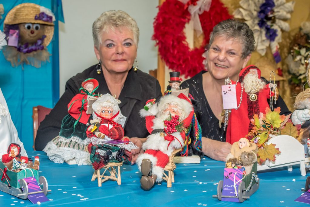 Karen Fletcher (left) and Joanne Moeller, both of Oliver, displayed Christmas figures they've made at the craft show hosted by 232 Bighorn Squadron Air Cadets in Oliver on Saturday. They purchase the heads and hands, mostly made of porcelain, and make the outfits themselves. (Richard McGuire photo)