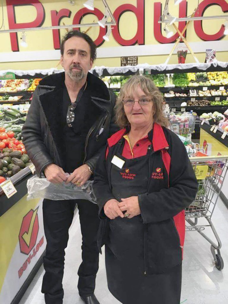 There was great excitement amongst some shoppers at the Osoyoos Buy-Low grocery store in November as Academy Award-winning actor Nicolas Cage dropped in to purchase a large order of groceries. Cage is seen above with Buy-Low employee Denise Gray. Cage was in Osoyoos where he’s the lead star in the new Canadian science-fiction thriller called The Humanity Bureau. (Facebook/Mary Fry)