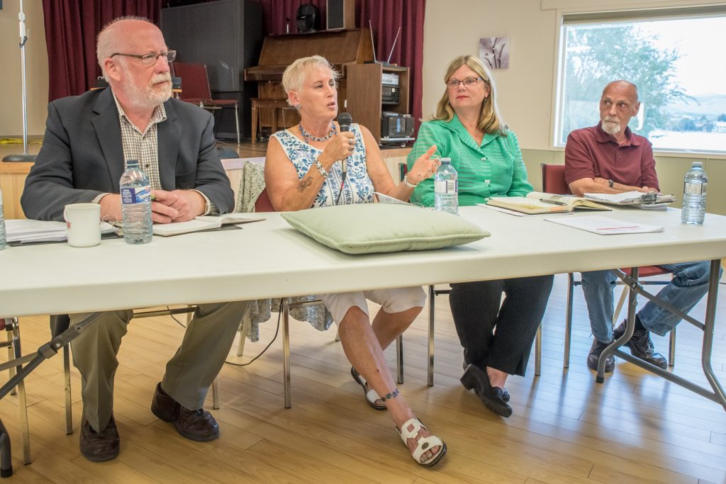 Moderator Cheryl Halsted (second from left) introduces the federal election candidates in South Okanagan-West Kootenay at an all-candidates forum Monday at the Osoyoos Seniors Centre. From left are Richard Cannings, NDP; Halsted; Connie Denesiuk, Liberal; and Brian Gray, independent. Conservative Marshall Neufeld did not attend. The meeting was sponsored by the Wine Country Retired Teachers Association. (Richard McGuire photo)