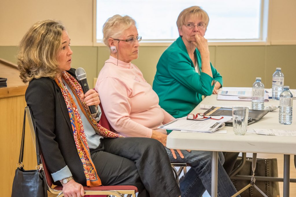 From left: Colleen Ross, NDP candidate; Cheryl Halsted, moderator; and Linda Larson, B.C. Liberal candidate and incumbent MLA. (Richard McGuire photo)