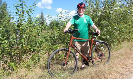 MP Cannings once again cycling through  riding to meet constituents, support for trails