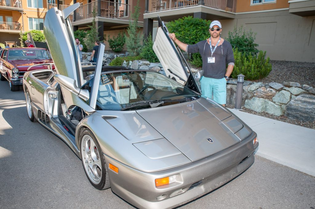 Roberto Giannini shows his Lamborghini Diablo VT Roadster, which was just one of the high-powered, high-priced cars setting out from Spirit Ridge Saturday in the Area 27 Rally. (Richard McGuire photo)
