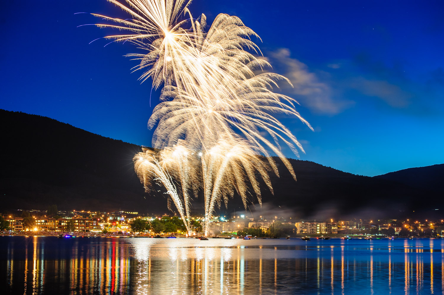 Fireworks burst over Osoyoos Lake to end the evening at Cherry Fiesta. (Richard McGuire photo)