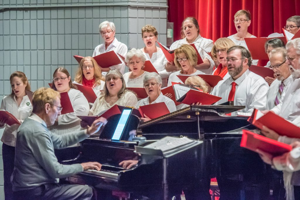 Many people came out on Friday night to hear Christmas songs at a concert by the Okanagan International Chorus at the Osoyoos Community Theatre. The following night, they performed at the Free Methodist Church in Oroville. The chorus, conducted by Lloyd Fairweather, is especially popular at Christmastime when they do several events. (Richard McGuire photo)