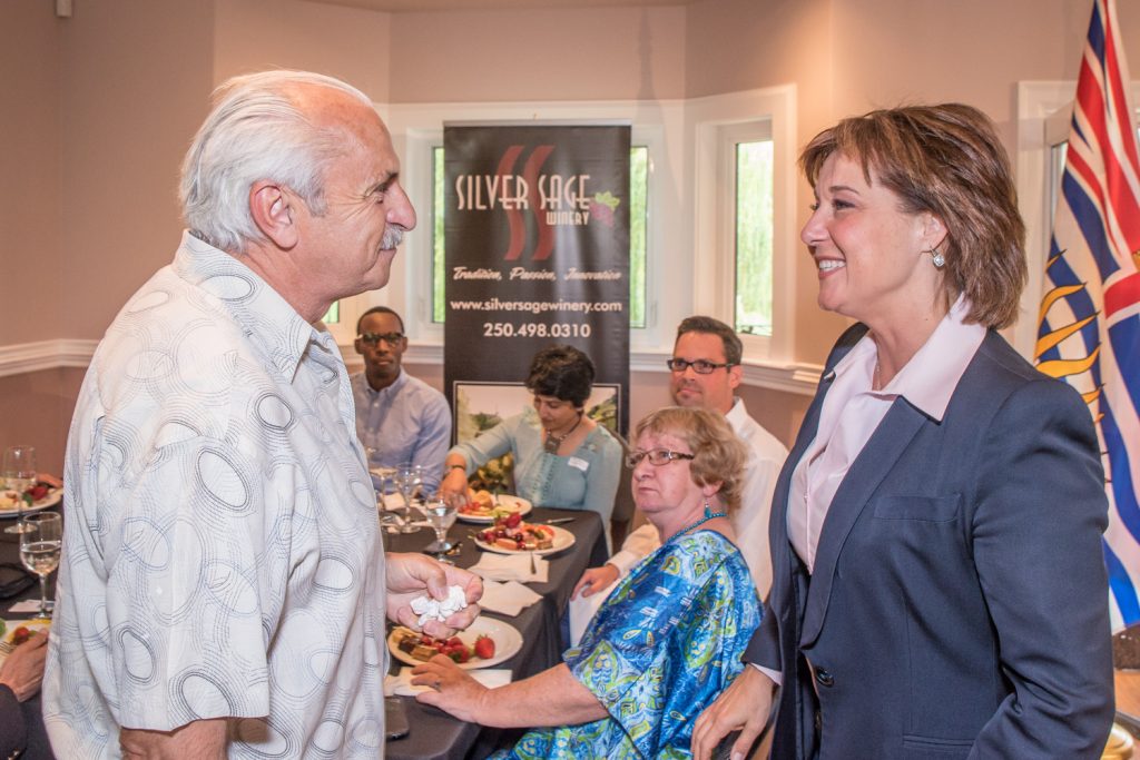 Osoyoos town councillor Jim King chats with Premier Christy Clark at a lunch organized by the South Okanagan Chamber of Commerce at the Silver Sage Winery last Thursday. (Richard McGuire photo)