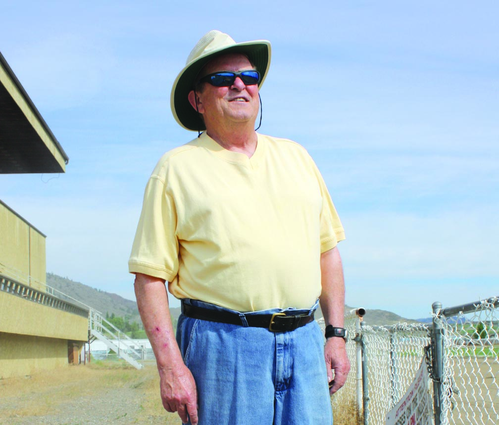 concertweb Former Osoyoos mayor Tom Shields surveys Desert Park on July 18. He has pitched a plan to Osoyoos town council that, if accepted, would bring large-scale concerts back to the facility. Photo by Paul Everest - Click on photo for larger image