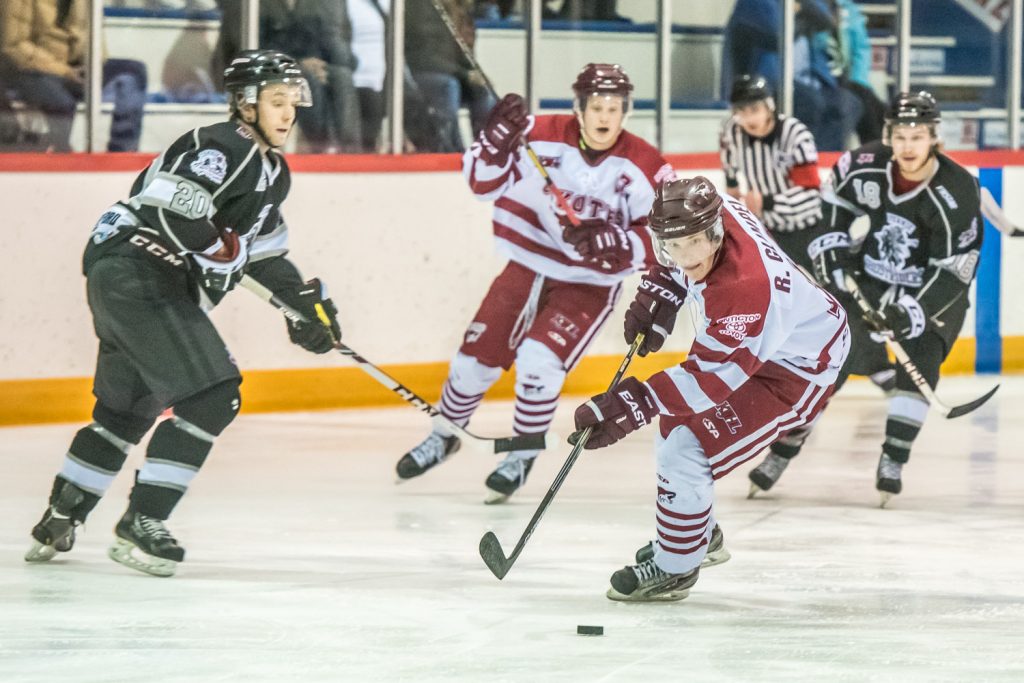 Bobby LaRue (No. 9) of the Osoyoos Coyotes tries unsuccessfully to flip a loose puck into the Kelowna net before Chiefs goalie Brady Lenardon managed to stop it. (Richard McGuire photo)