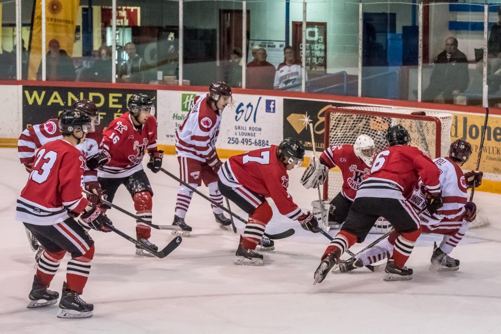 Colin Bell (right) skates off after flipping the puck into the Kelowna net to score the Coyotes' second goal of Saturday's 3-0 Osoyoos victory. Austin Cleaver and Matthew Adams assisted. (Richard McGuire photo)