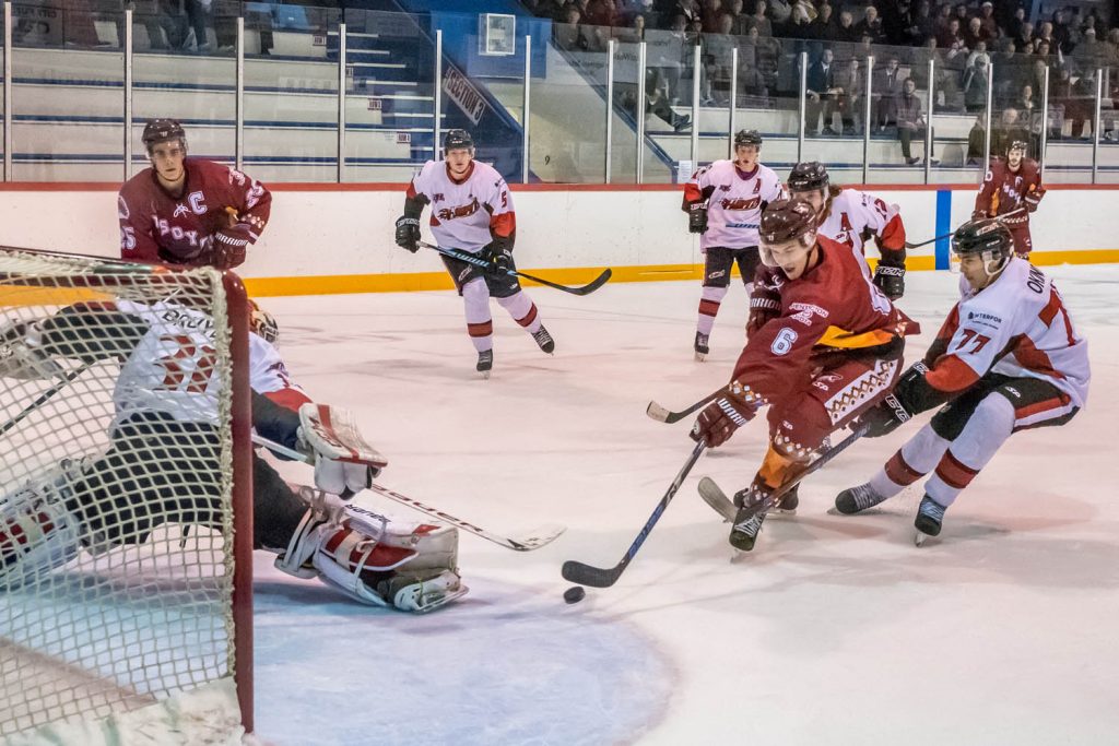 Ryan Roseboom (No. 6) swoops in to score a power play goal against the Chase Heat. Roseboom, a star in the 2014-15 season, had just returned to the Coyotes. Although his two power play games weren't enough to earn the Coyotes a win for that game, the team has hovered around first place for much of the fall. (Richard McGuire photo)