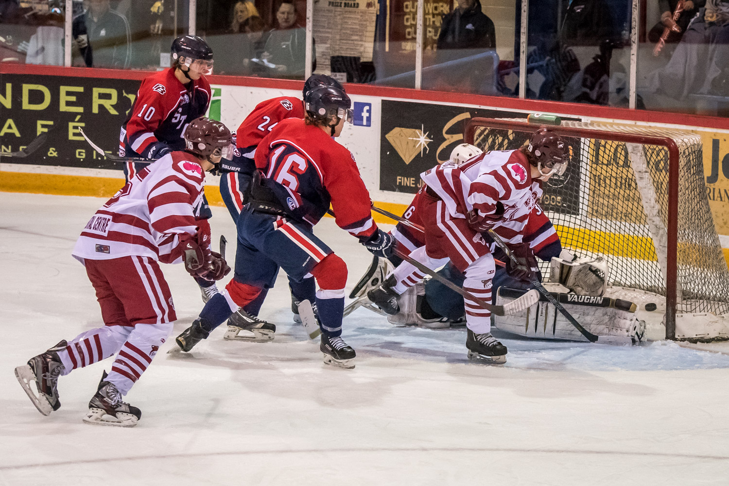 Nolan Zweep (right) picked up a loose puck in front of Kamloops goalie Jason Sandhu and flipped it into the net. This was the third Coyote goal in the team's 4-3 victory over Kamloops on Friday evening. It was rookie Zweep's first goal for the Coyotes. (Richard McGuire photo)