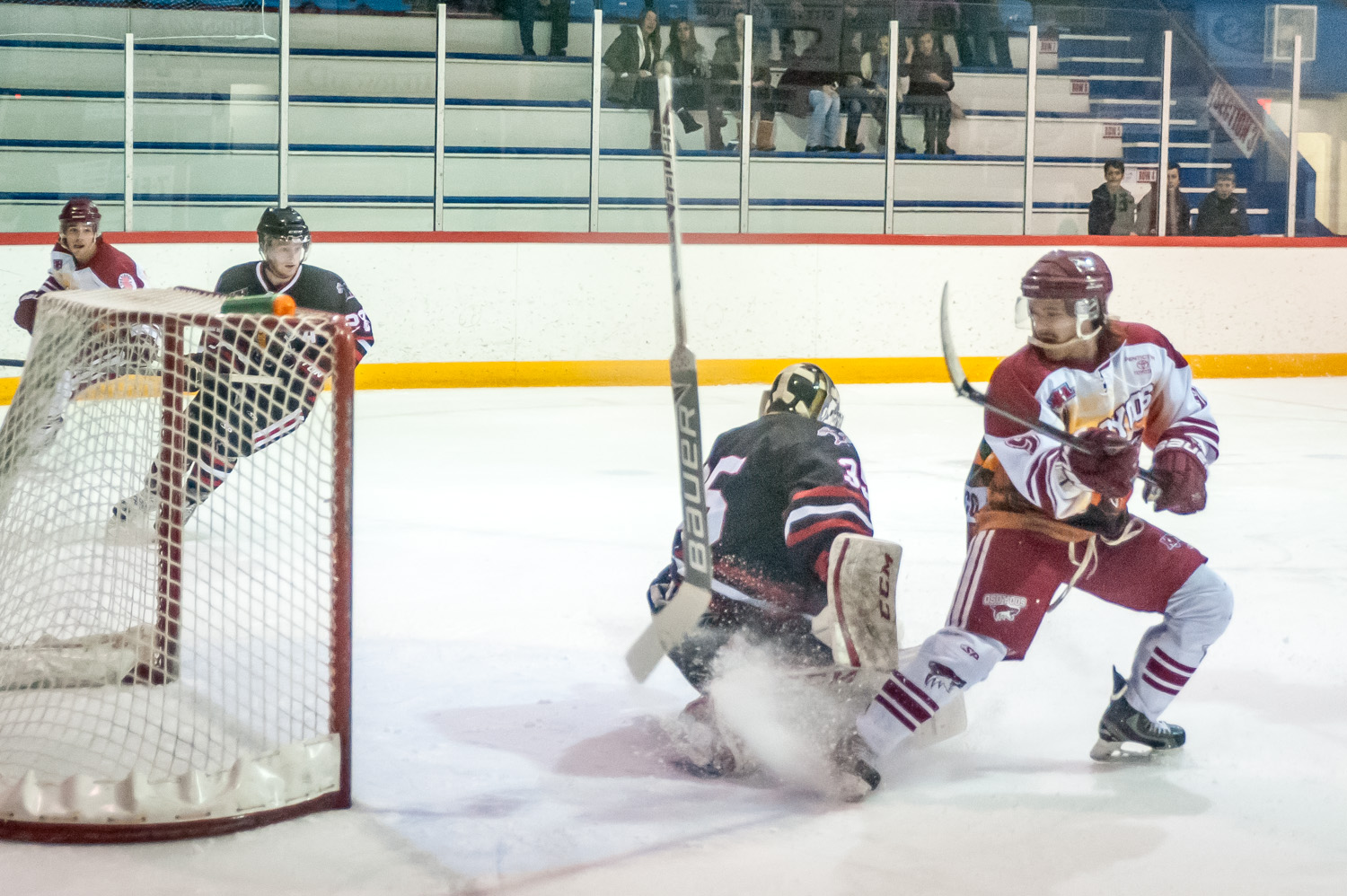 Coyote Cameron Dobransky swoops in with the puck, sending Kelowna goalie Tyler O'Donnell's stick into orbit. Despite the goalie having to play briefly without a stick, the Coyotes were unable to score. (Richard McGuire photo)