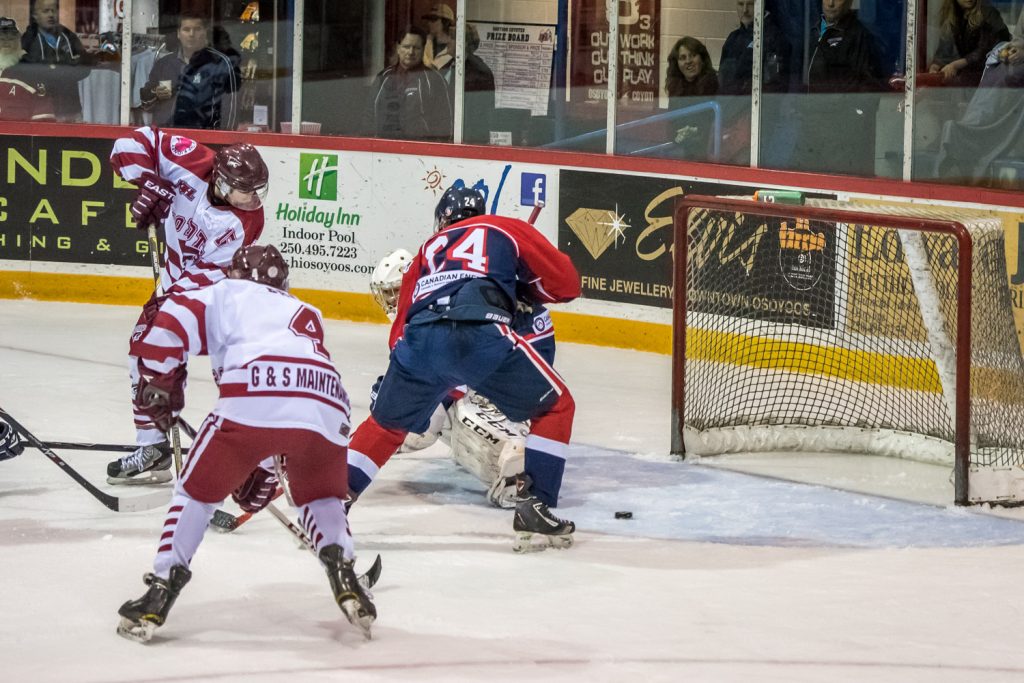 Jonathan Lee (No. 6) of the Kelowna Chiefs had a breakaway, but Coyote captain Rainer Glimpel (No. 14) and goalie Brett Soles managed to stop him. Lee was awarded a penalty shot, but failed to score. (Richard McGuire photo)