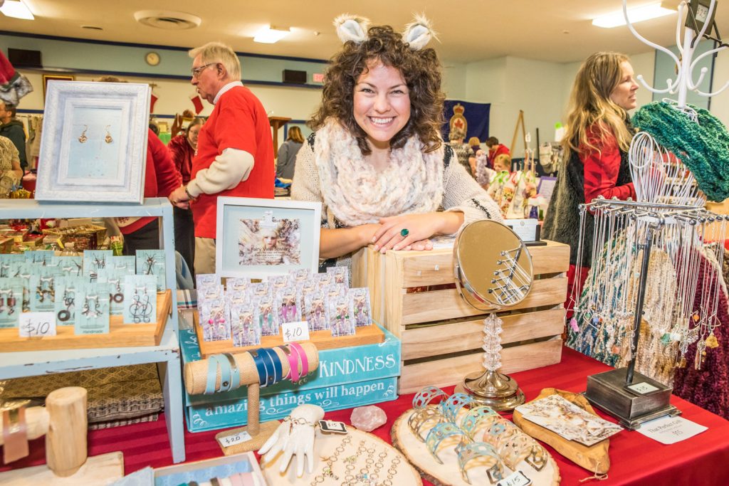 Yinet Gonzales was selling beautiful jewelry she makes herself at the Kiwanis Christmas Craft Fair on Saturday morning at the Legion. Among her creations are earrings, bracelets, necklaces and scarves. She also sells her products at Market on Main in the summer. (Richard McGuire photo)
