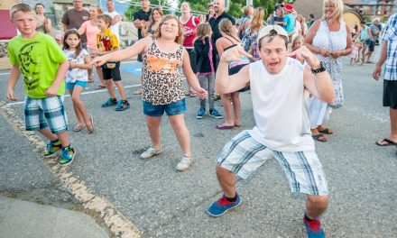 Children shake to first street dance of summer