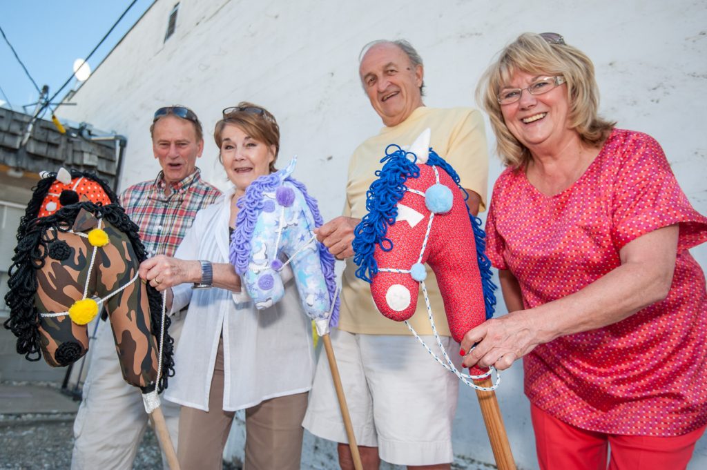 The wooden horses are ready for Derby Night on Saturday and the four-legged horses are being prepared for the first racing day this year at Desert Park on June 14. Trying out the wooden horses were (from left) Ian and Helen Ritchie, Elden Schorn and Carol Youngberg. The Ritchies are the proud owners of a wooden horse sponsored by their business, Luna del Sol. Youngberg is president of the Desert Park Exhibition Society. (Richard McGuire photo)