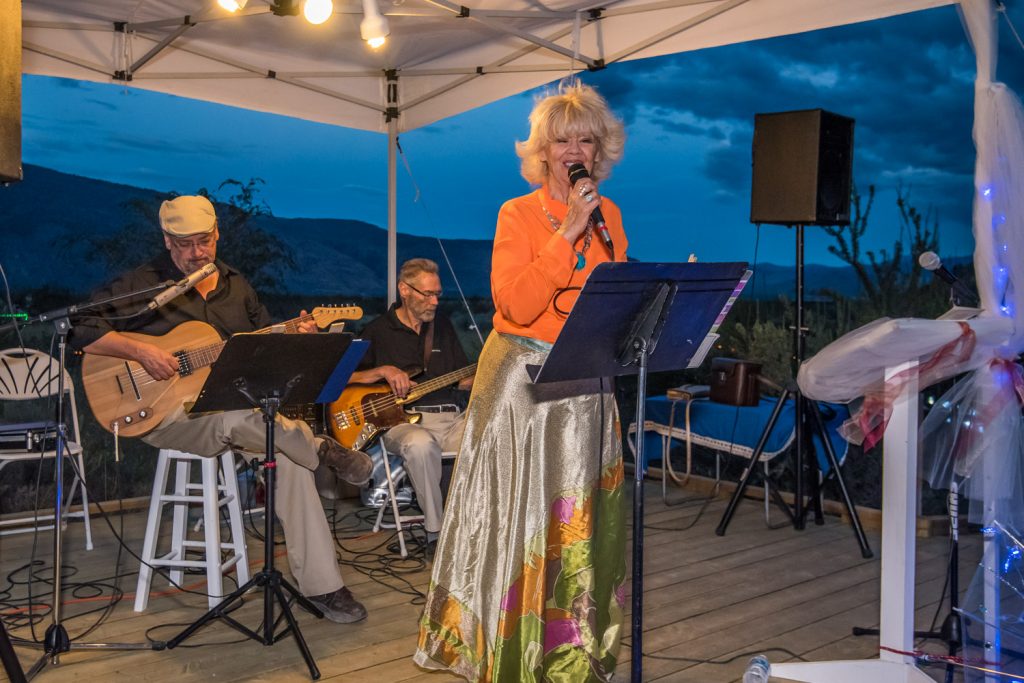 Singer Iris Larratt entertains guests at Romancing the Desert accompanied by follow Jazz Out West musicians Bob Park (left) and Bob Larratt. (Richard McGuire photo)