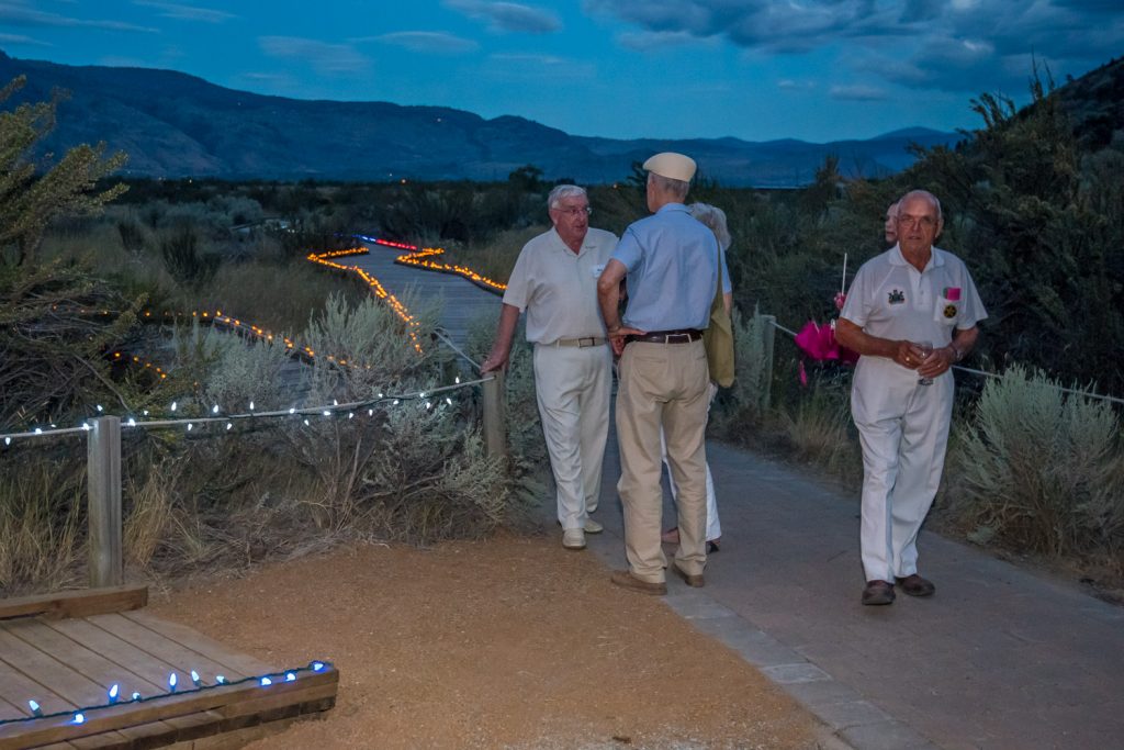 Coloured lights line the start of the boardwalk as evening falls at Romancing the Desert on Saturday evening. (Richard McGuire photo)