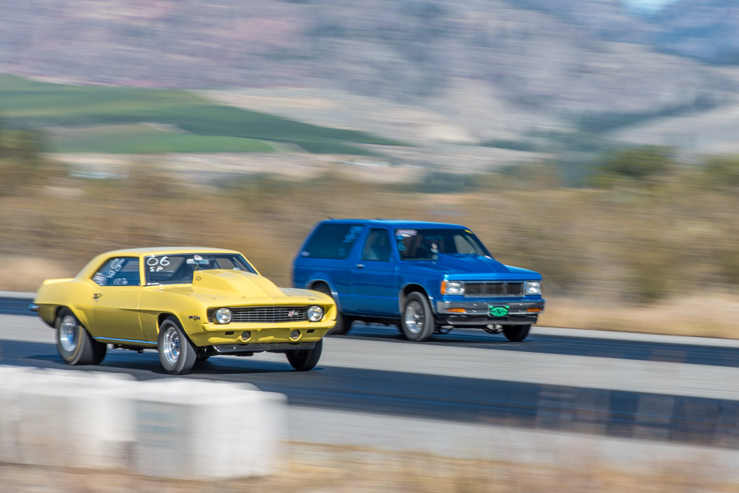 Two cars race down the track at the Wine Country Racing Association's drag races on Sunday. It was a beautiful day and the races were well attended. For those who missed the fun, there will be one more race date this year on Sunday, Oct. 11. (Richard McGuire photo)