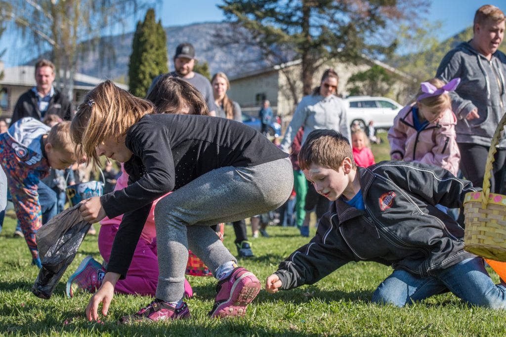 No sooner did Mayor Sue McKortoff utter the word "go" when swarms of children raced out onto the field with Easter baskets in their hands. The Easter egg hunt is always one of the highlights of Easter Eggstravaganza. Children scooped up all the eggs in seconds, some assisted by their parents. (Richard McGuire photo)