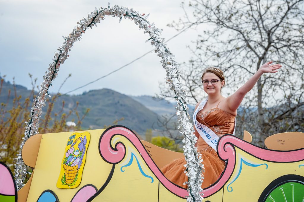 Princess Viveka Jensen was alone riding the float for Osoyoos Royalty during the Easter parade Saturday. Five new Royalty contestants are competing and the new Royalty will be chosen at the end of June. (Richard McGuire photo)