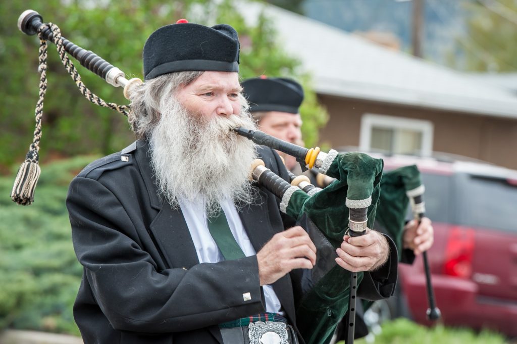 It was the Easter parade, but this member of Summerland Pipes and Drums would probably look right at home in the Santa Claus parade as well. The band marched near the front of the parade and provided musical accompaniment. Other band members were clean shaven. (Richard McGuire photo)