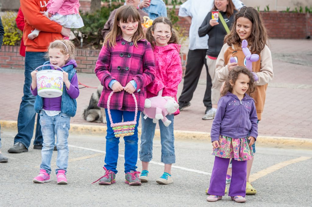 Although this year's Easter parade was smaller than in previous years, many local residents lined Main Street to watch the parade. (Richard McGuire photo)
