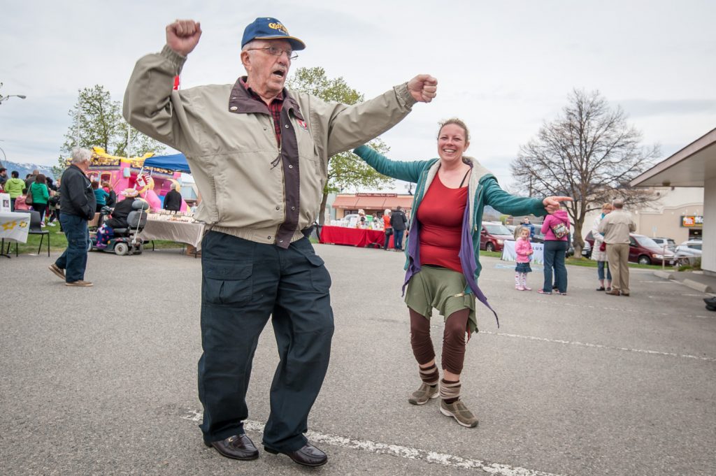 The Osoyoos Street Dances don't come until the summer, but Phil MacLeod (left) and Raya Boyd got into the spirit at Town Square during Easter Eggstravaganza. Managing the recorded music for the event was Stacy Little, of Better at Home, who also picks the music for the street dances. (Richard McGuire photo)