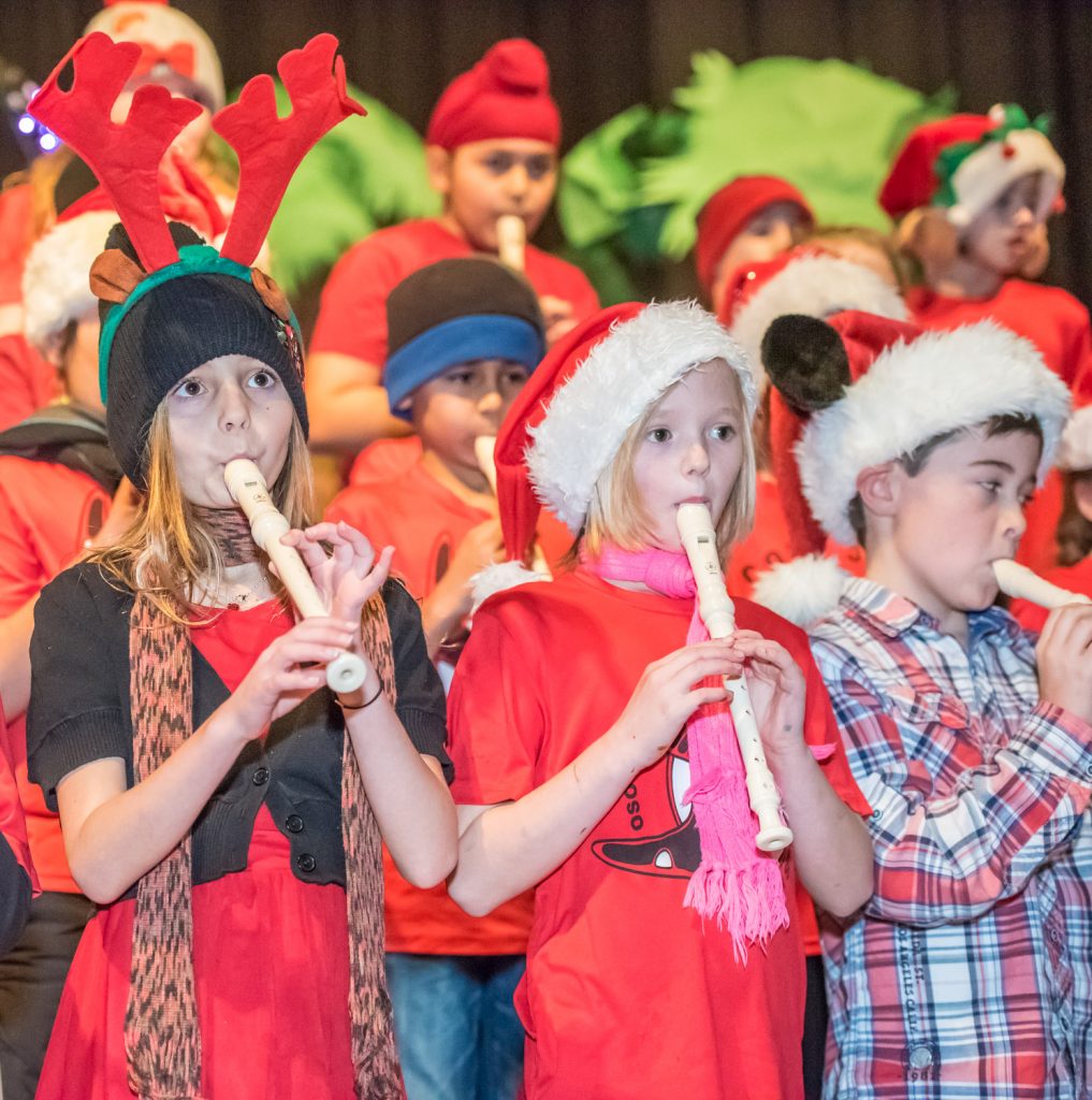 These children from teachers Richard Bayliss and Heather Langley's Grades 3 and 4 classes performed Jolly Old St. Nicholas on recorder. Front row from left are Meadow Stanberg, Natalie Nailbn and Allen Singer. (Richard McGuire photo