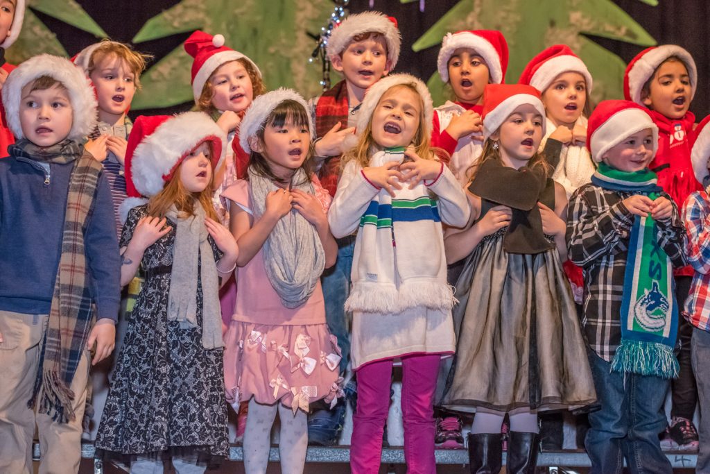 Kindergarten students from Rebecca Bayda and Lisa Kunz's classes were cutely dressed as they performed longs about Santa and snowmen. (Richard McGuire photo)
