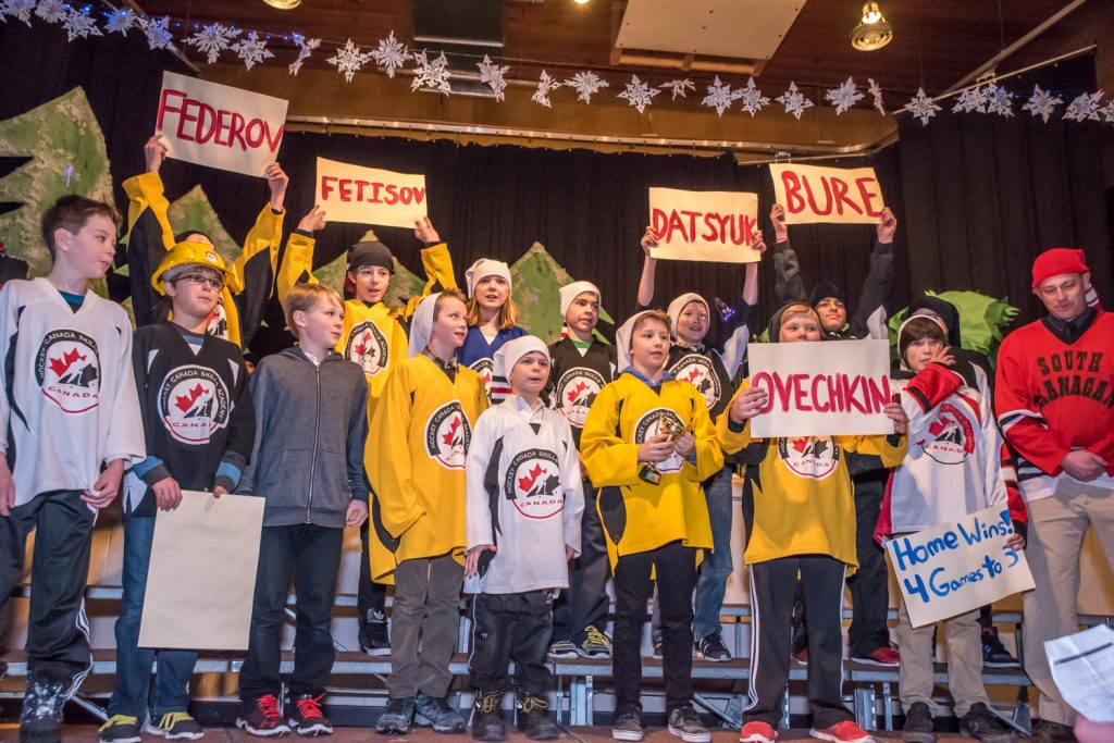 The Hockey Academy at Osoyoos Elementary School performed 12 Days of Hockey Christmas. When they came to "Five Russian Players" they held up signs with players' names. (Richard McGuire photo)