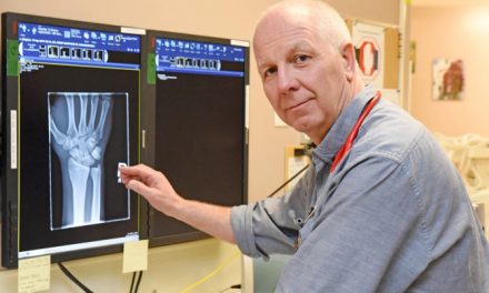 Dr. Entwistle working 14-hour shift on election night